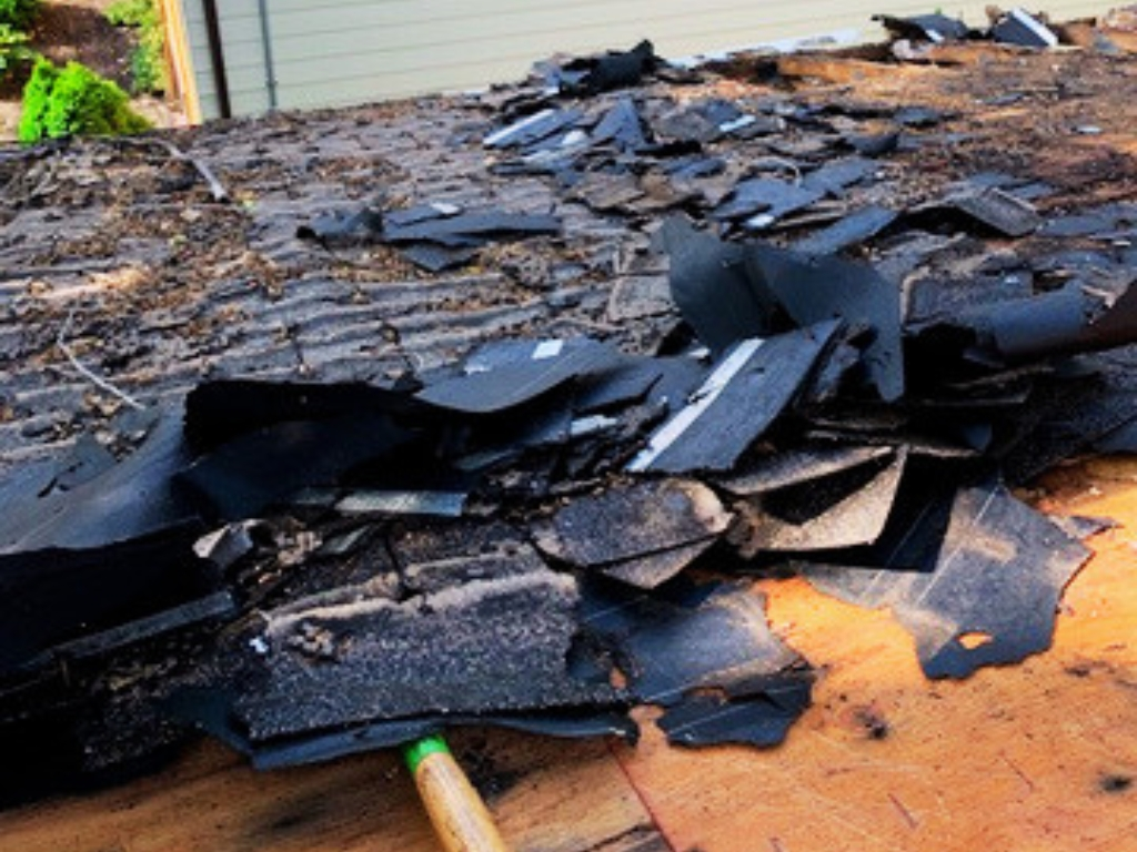 Pulling shingles off for roof replacement